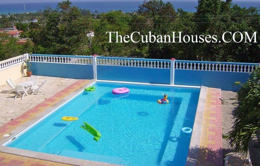 Casa Lidia en playa Guanabo, 3 habitaciones con piscina y ranchón